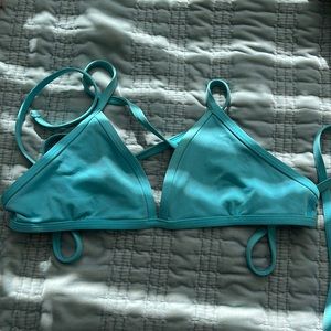 Jolyn triangle top, blue. Size medium.